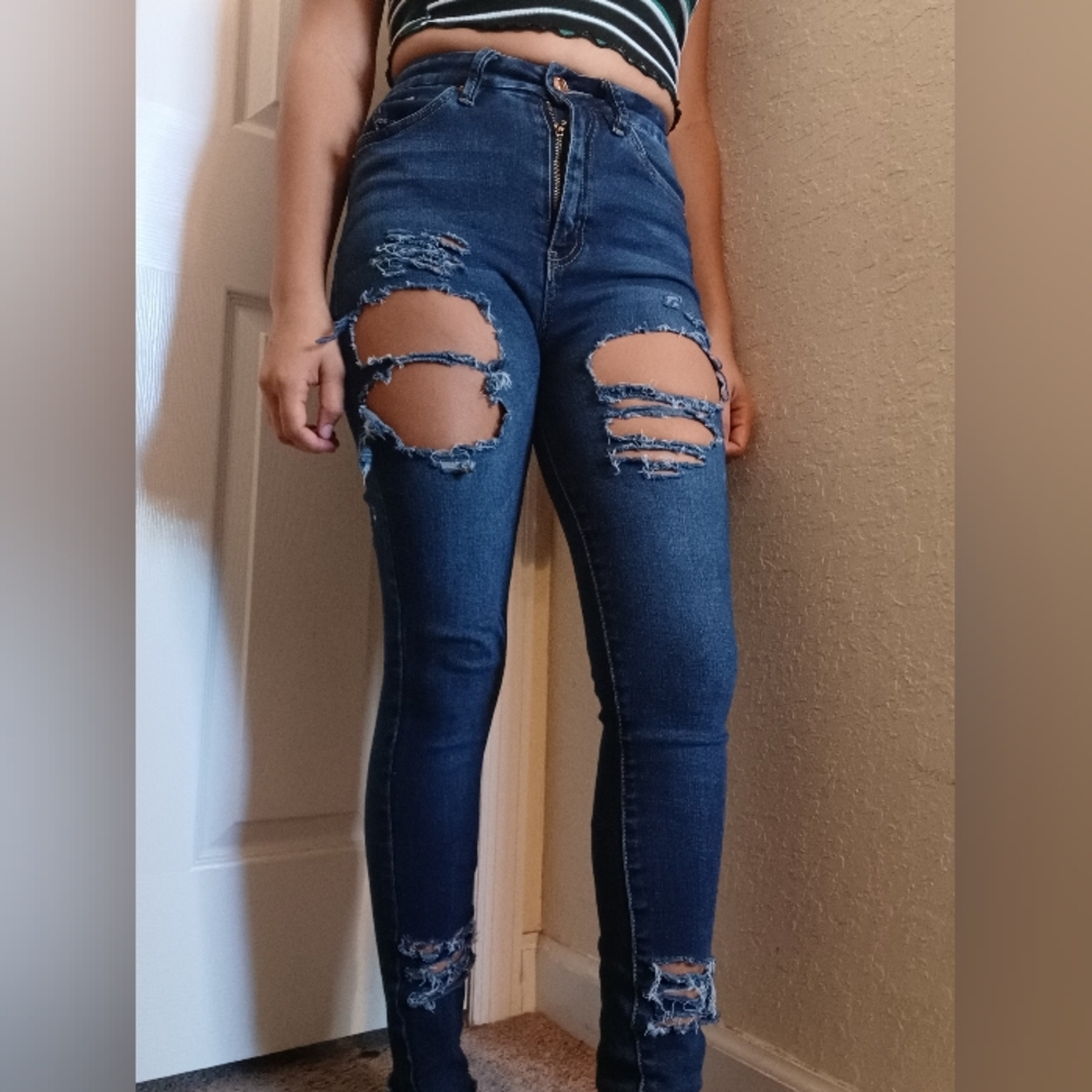 Dark wash ripped denim jeans